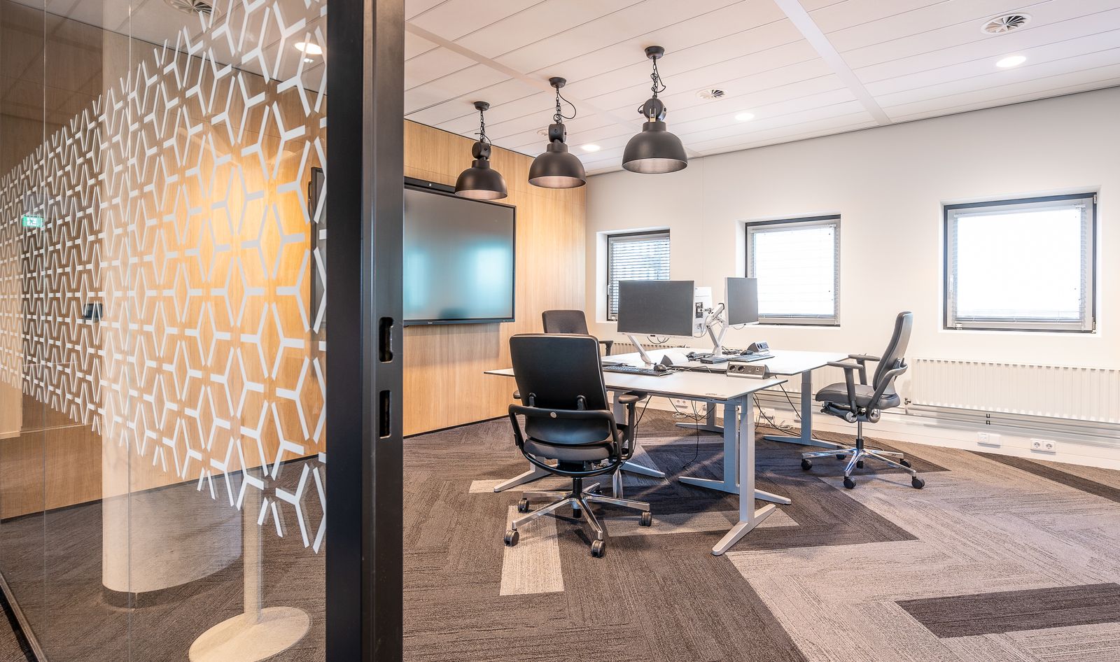 Contemporary office with timber partitions and desks
